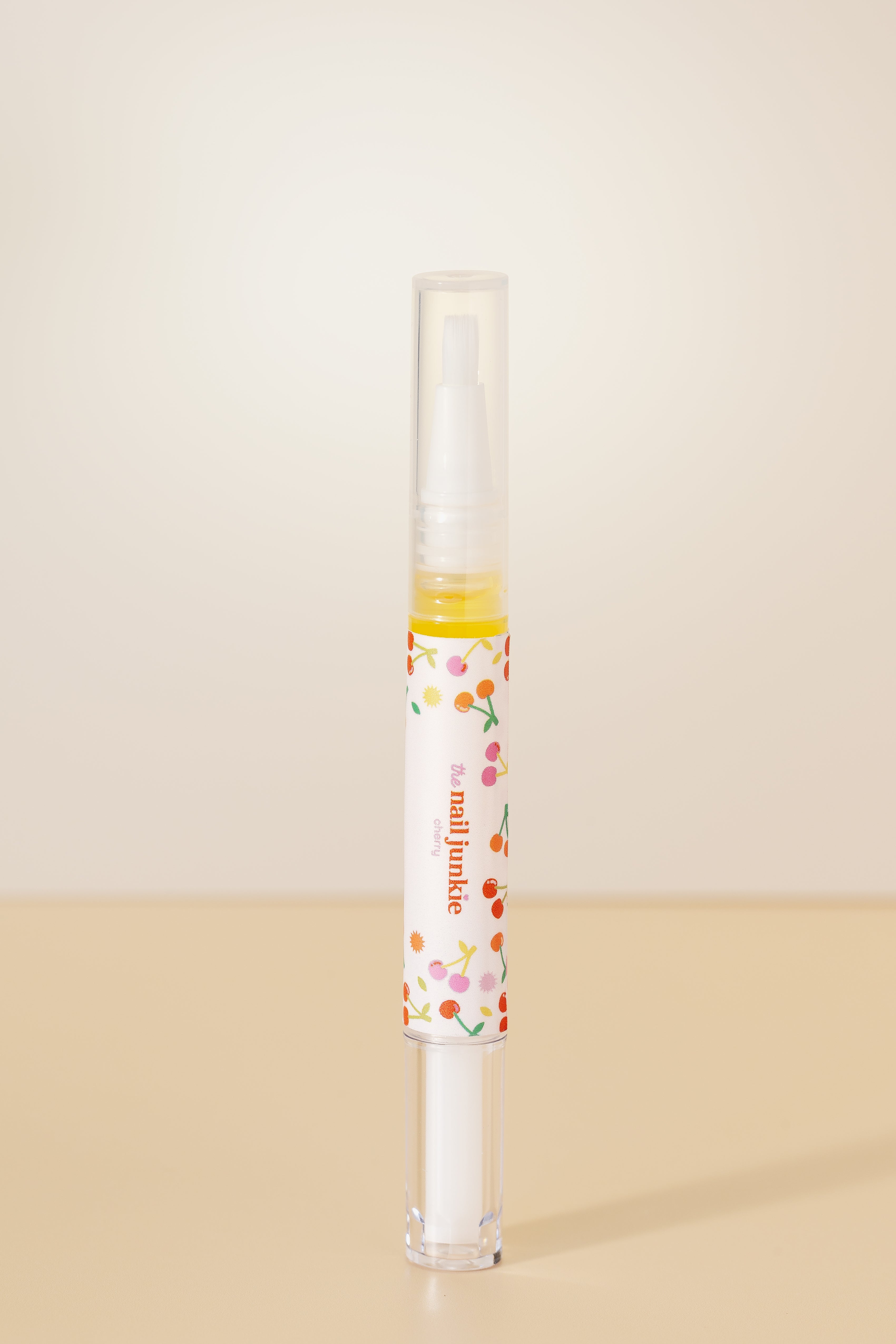 Cherry scented cuticle oil pen by The Nail Junkie