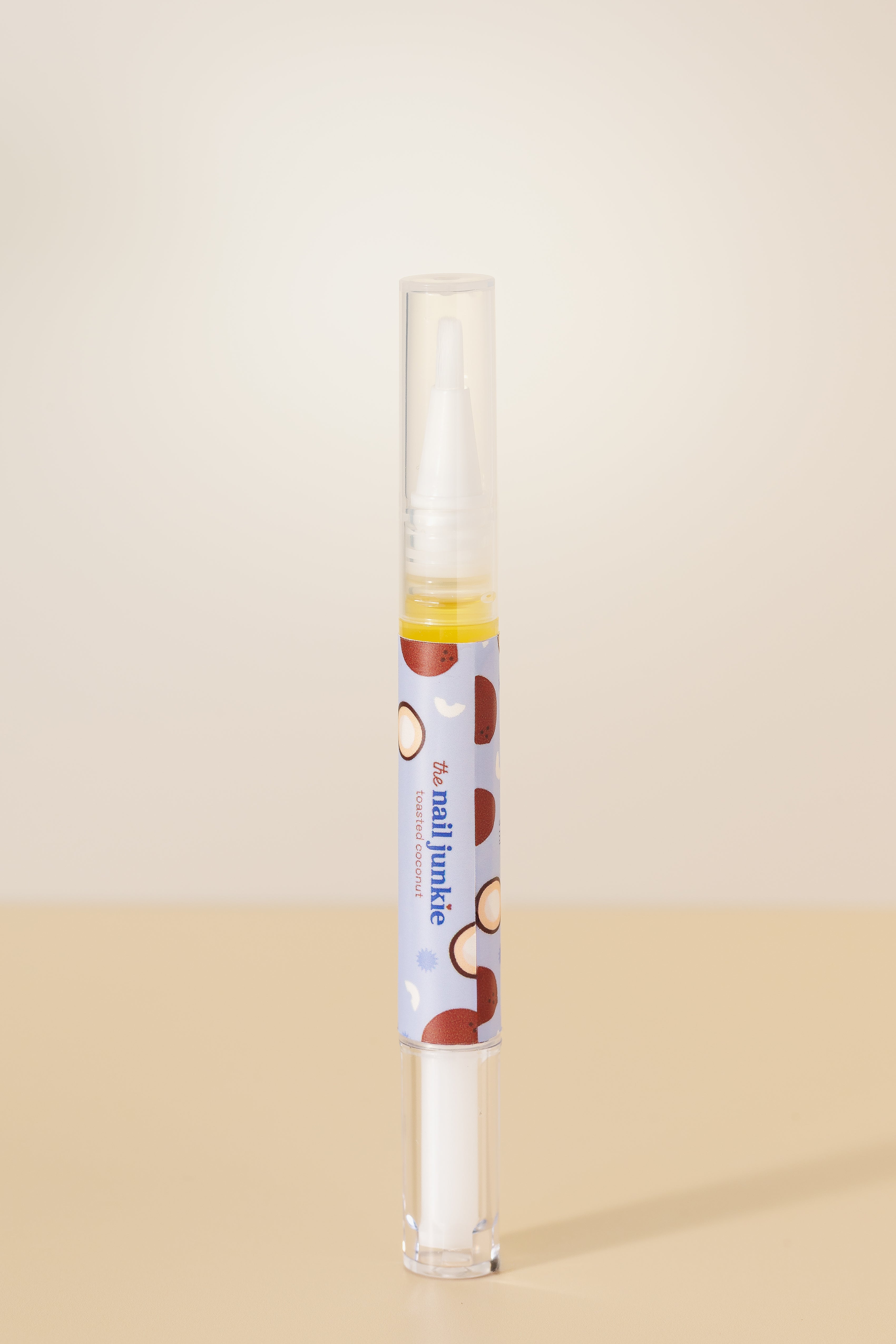 Toasted Coconut scented cuticle oil pen by The Nail Junkie